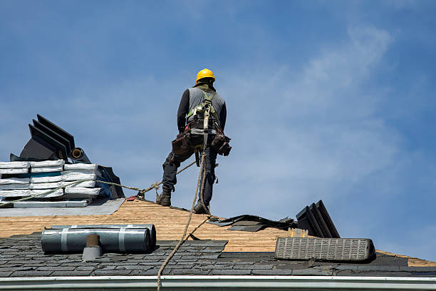 Professional Roof Replacement technician working in Clay, NY